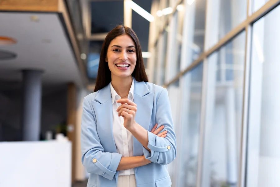 Smiling professional in a blue jacket